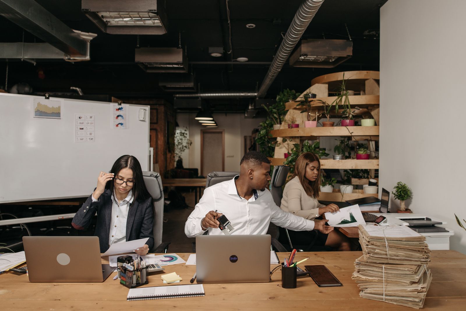 Nexum Forge engineers working together in a modern office