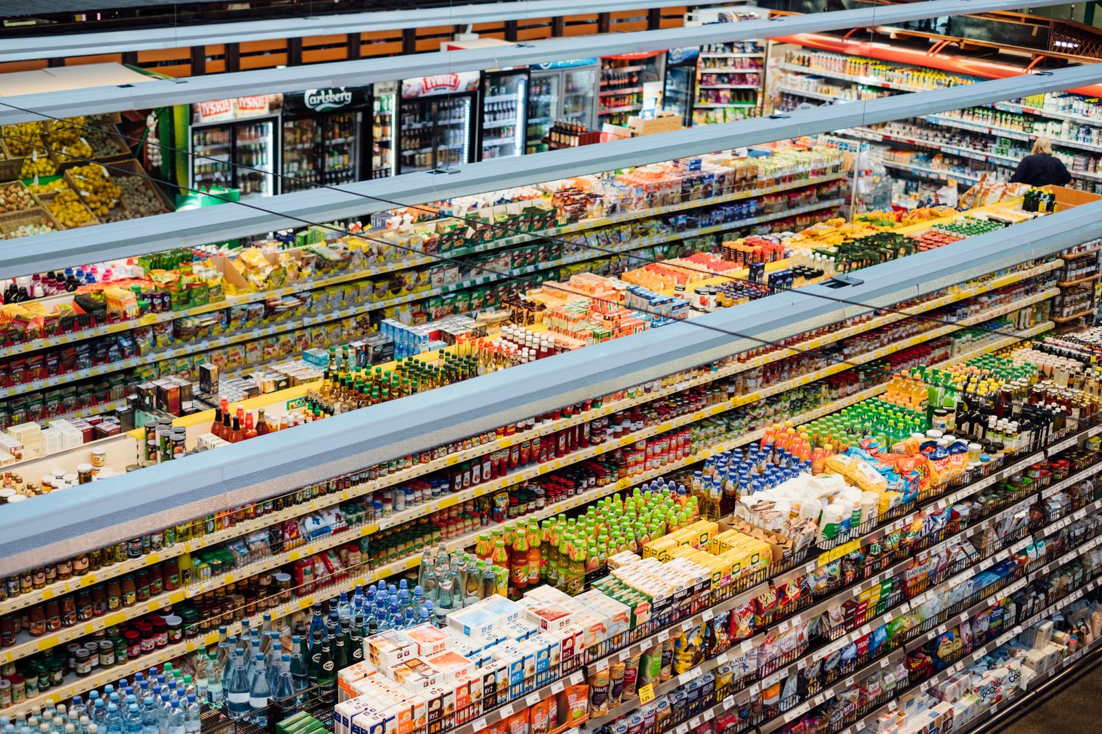 Supermarket produce aisle representing grocery and food eCommerce