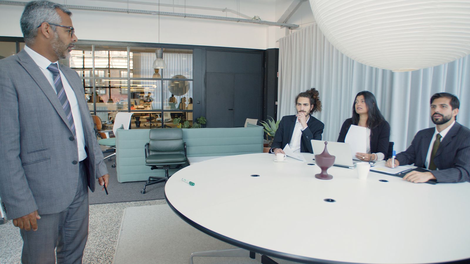 Nexum Forge leadership team in a strategy meeting