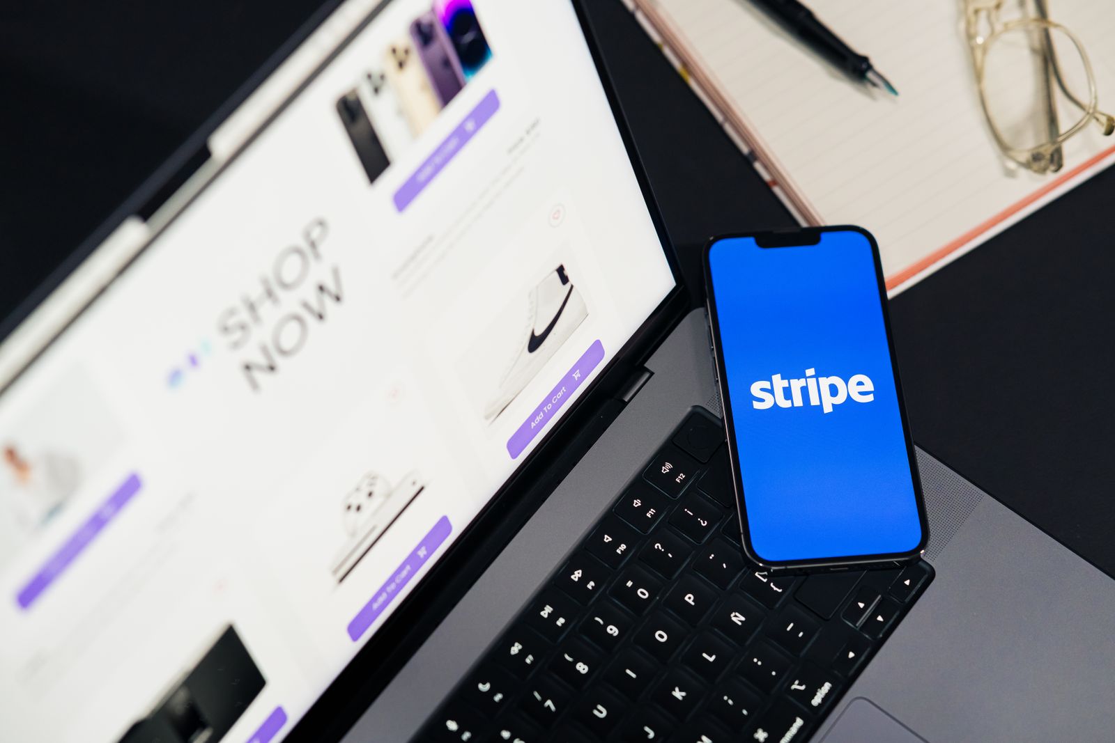 Online payment integration tested on a laptop and mobile phone